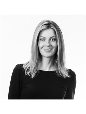 Corina A. Karas