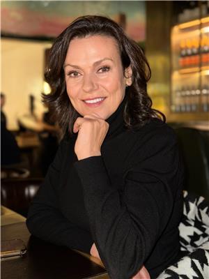 TOULA COUSENS