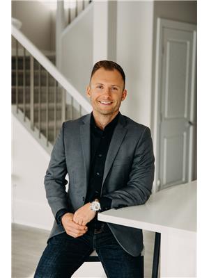 Travis J. Hawryluk