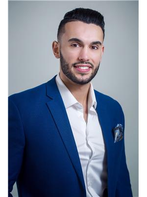 T.J. NEHMETALLAH