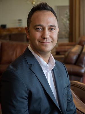 LOUIS TAVAKOLI