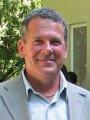 JOHN L. ALKINS
