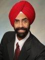 ARUNJIT QAUMI