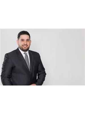 HUSSEIN ALI EL-MNINI