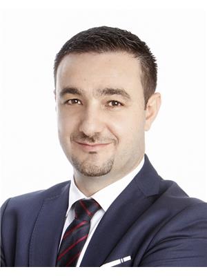 ADAM ALKALAANI