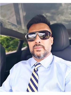 MANINDER BHATIA