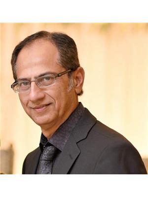TANVEER AZIZ