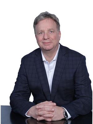 RAYMOND R. ADELSON
