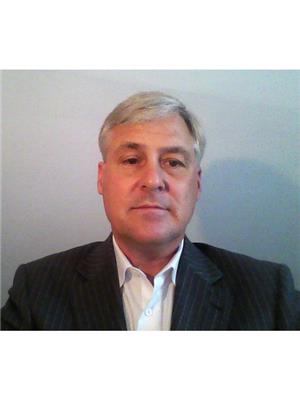 MARK CHAPMAN