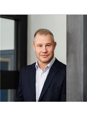 TIM A. ARTUCHOV