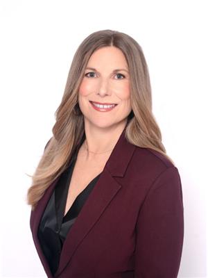 NADINE COMEAU