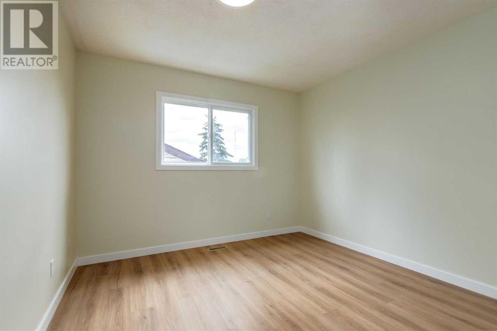 Single Family House Bi-level for Sale in  Abalone Crescent NE Abbeydale Calgary 