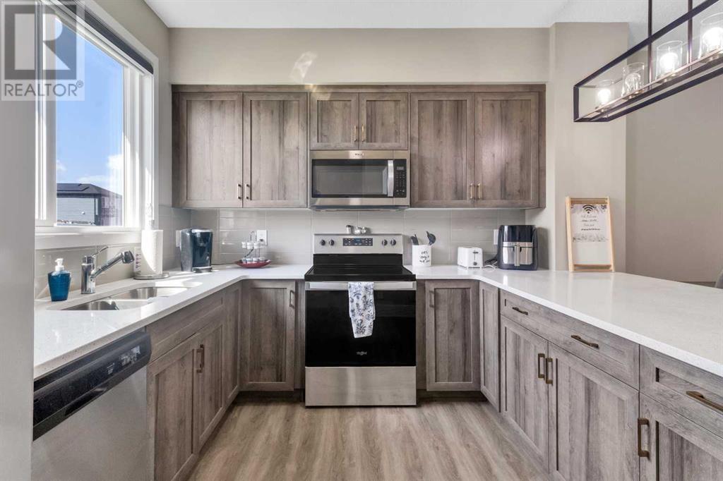 Single Family House for Sale in  Belmont Drive SW Belmont Calgary 