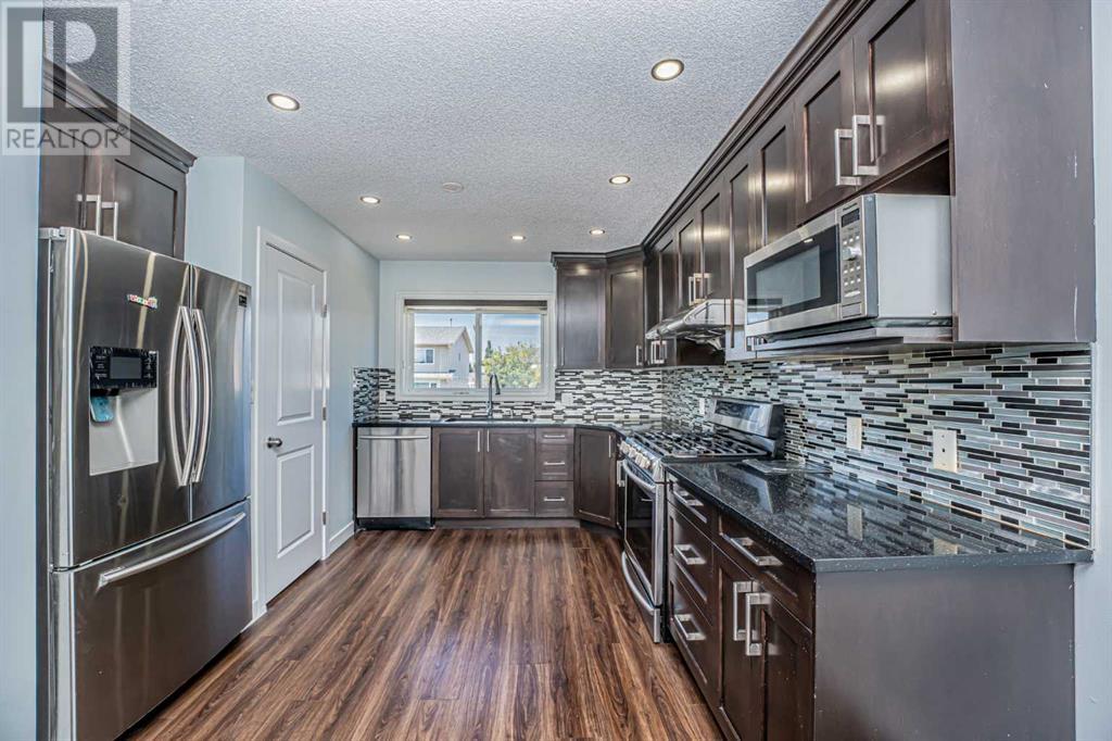 Single Family House Bi-level for Sale in  Castlebrook Rise NE Castleridge Calgary 