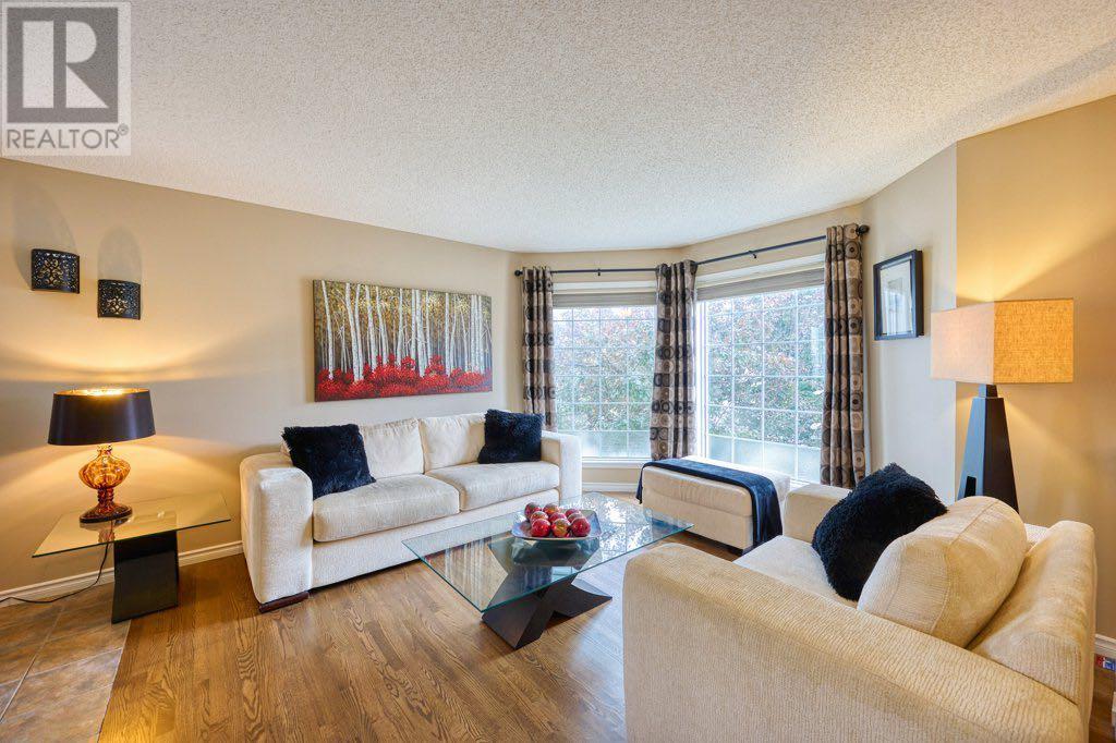 Single Family House Bi-level for Sale in  Sandringham Close NW Sandstone Valley Calgary 