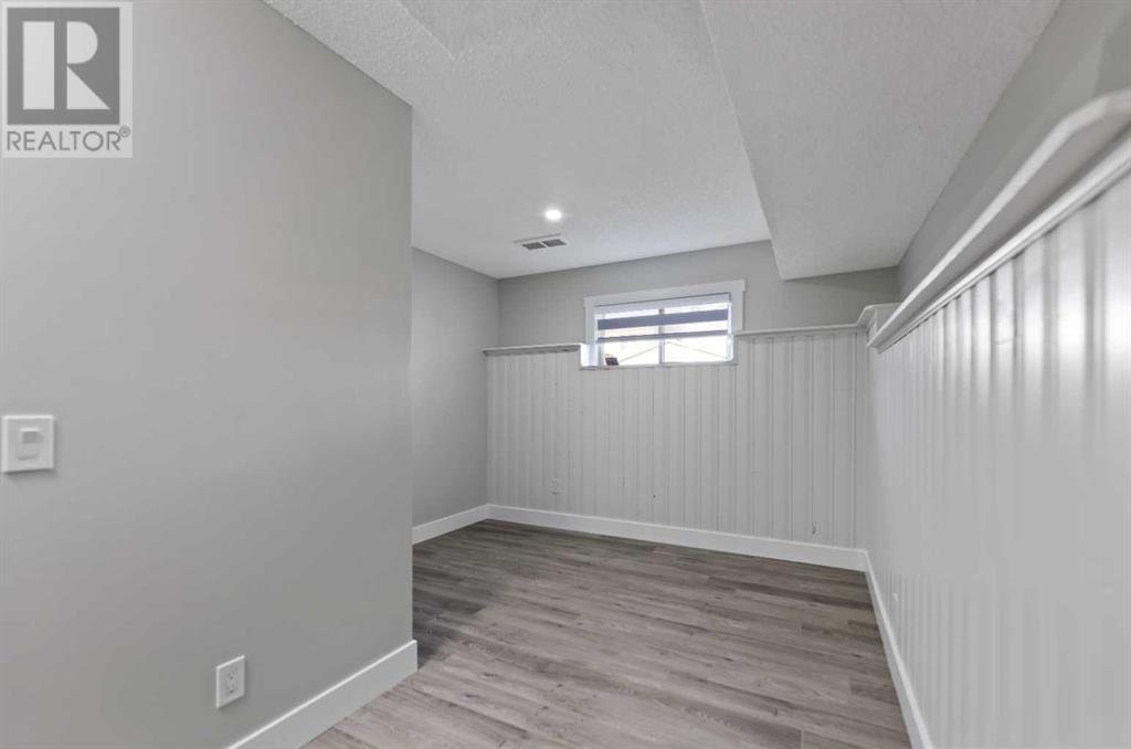 Single Family House Bi-level for Sale in  Laguna Circle NE Monterey Park Calgary 