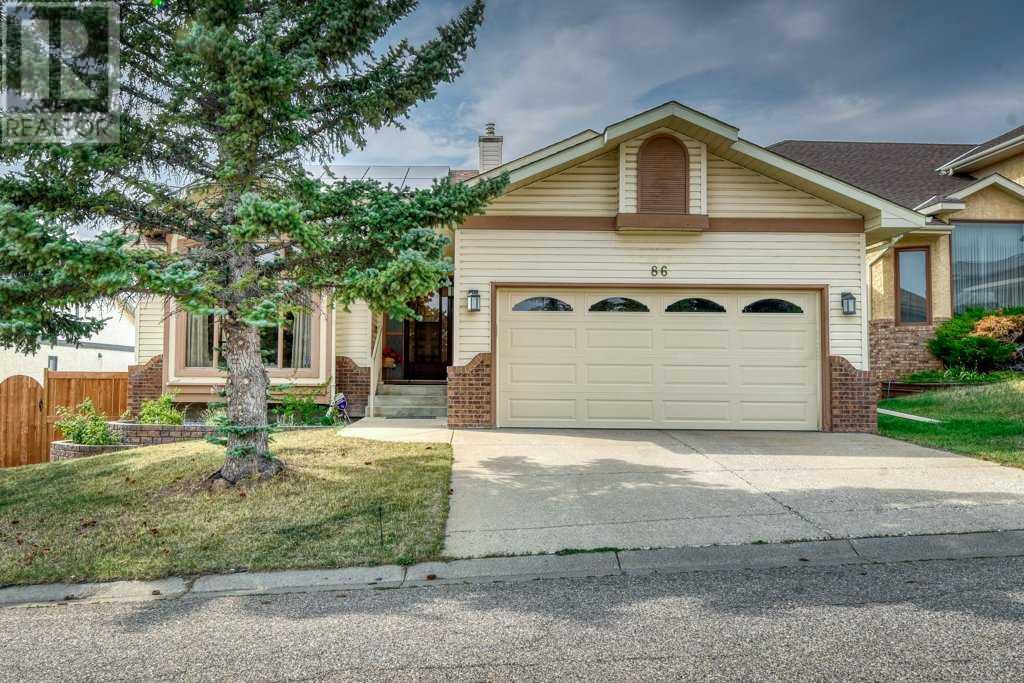 Single Family House Bungalow for Sale in  Hawkdale Circle NW Hawkwood Calgary 