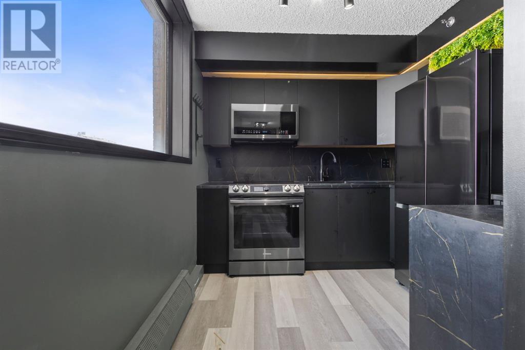 Single Family House High rise for Sale in    Ave SE Chinatown Calgary 