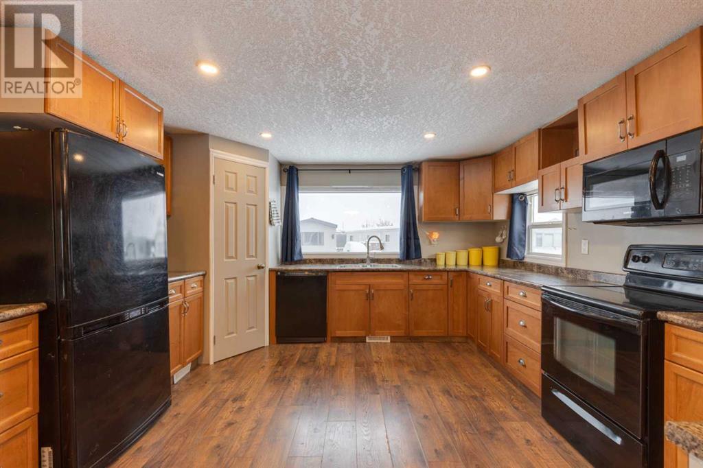 Single Family House Mobile Home for Sale in    Avenue Penbrooke Meadows Calgary 