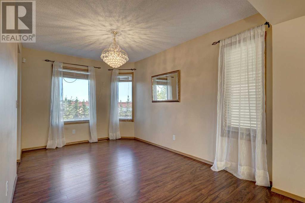 Single Family House for Sale in  Hawkdale Close NW Hawkwood Calgary 