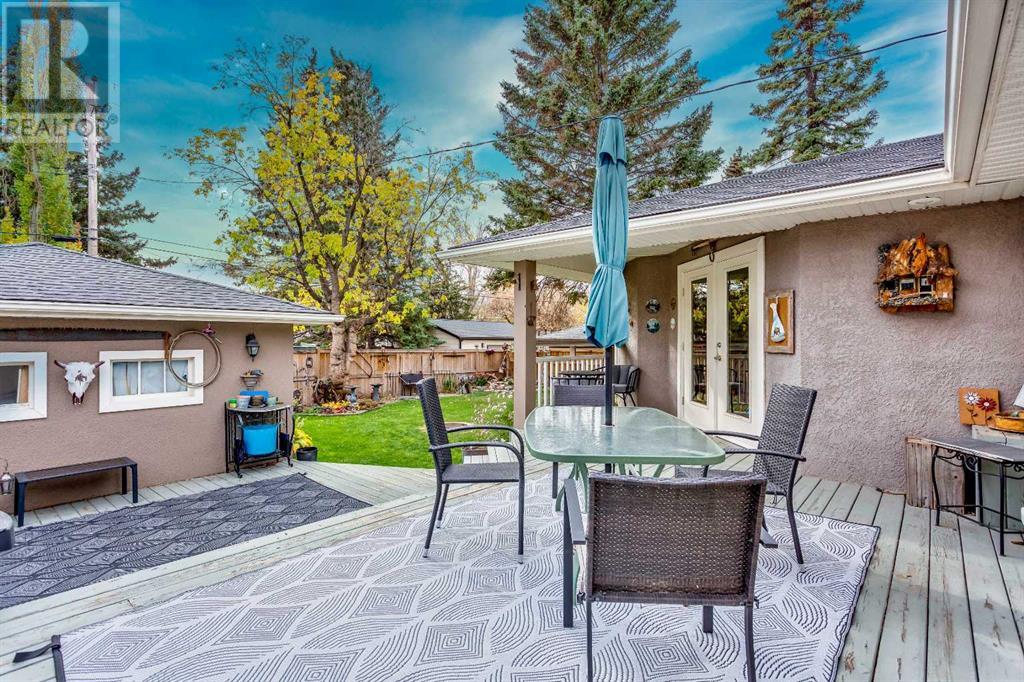 Single Family House Bungalow for Sale in  Langton Drive SW North Glenmore Park Calgary 