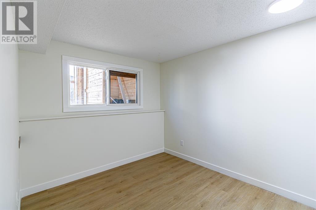 Single Family House Bi-level for Sale in    Street SE Forest Lawn Calgary 