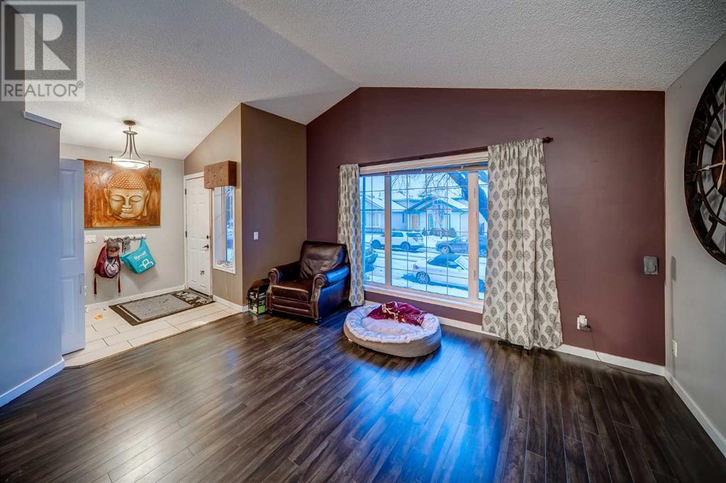 Single Family House 3 Level for Sale in  Mt Allan Circle SE McKenzie Lake Calgary 