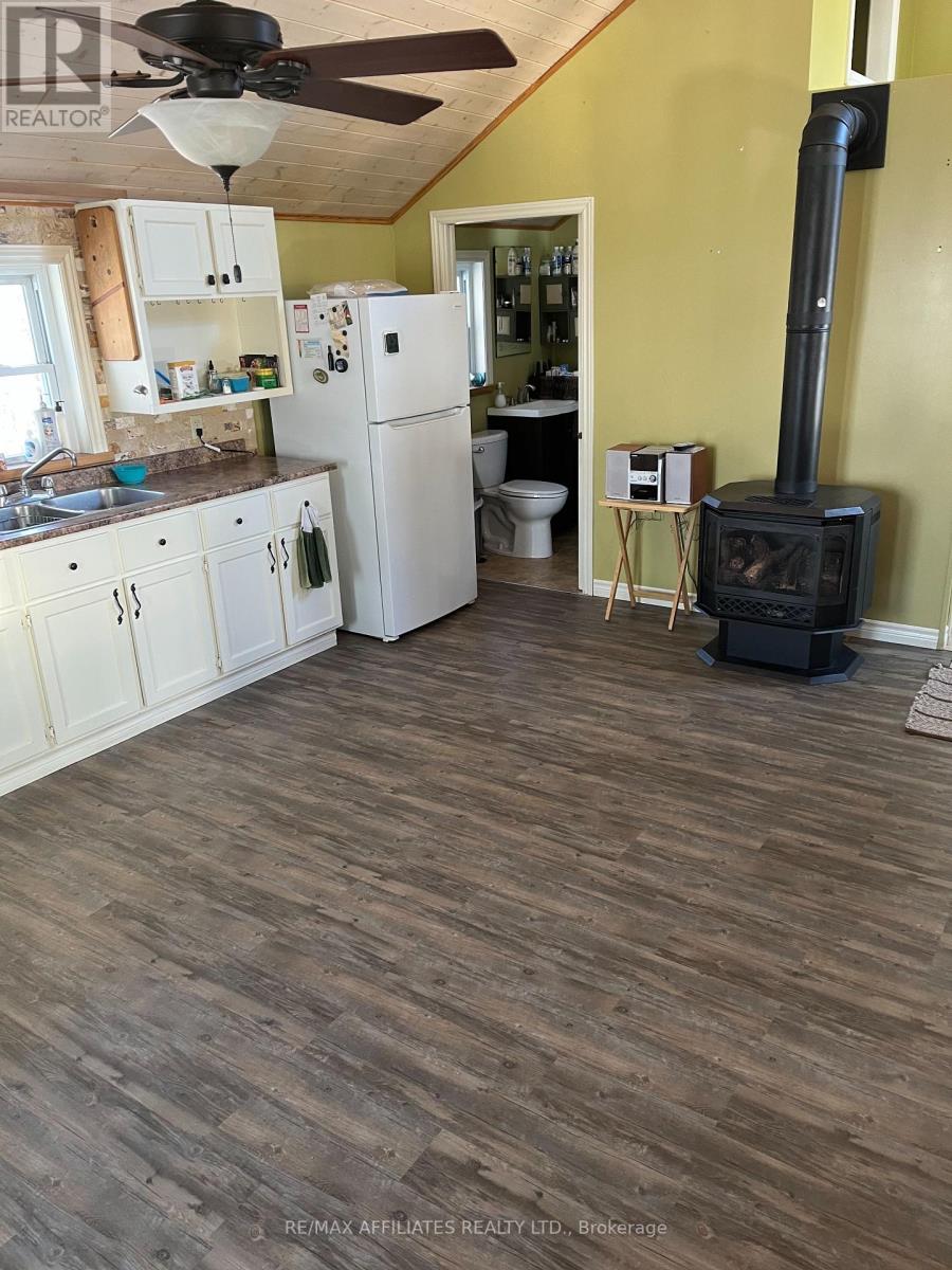 Photo 5 of 19 West Devil Lk Lane E, Frontenac ON