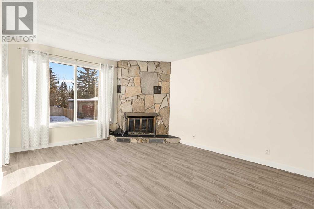 Single Family House Bi-level for Sale in  Deer Ridge Way SE Deer Ridge Calgary 