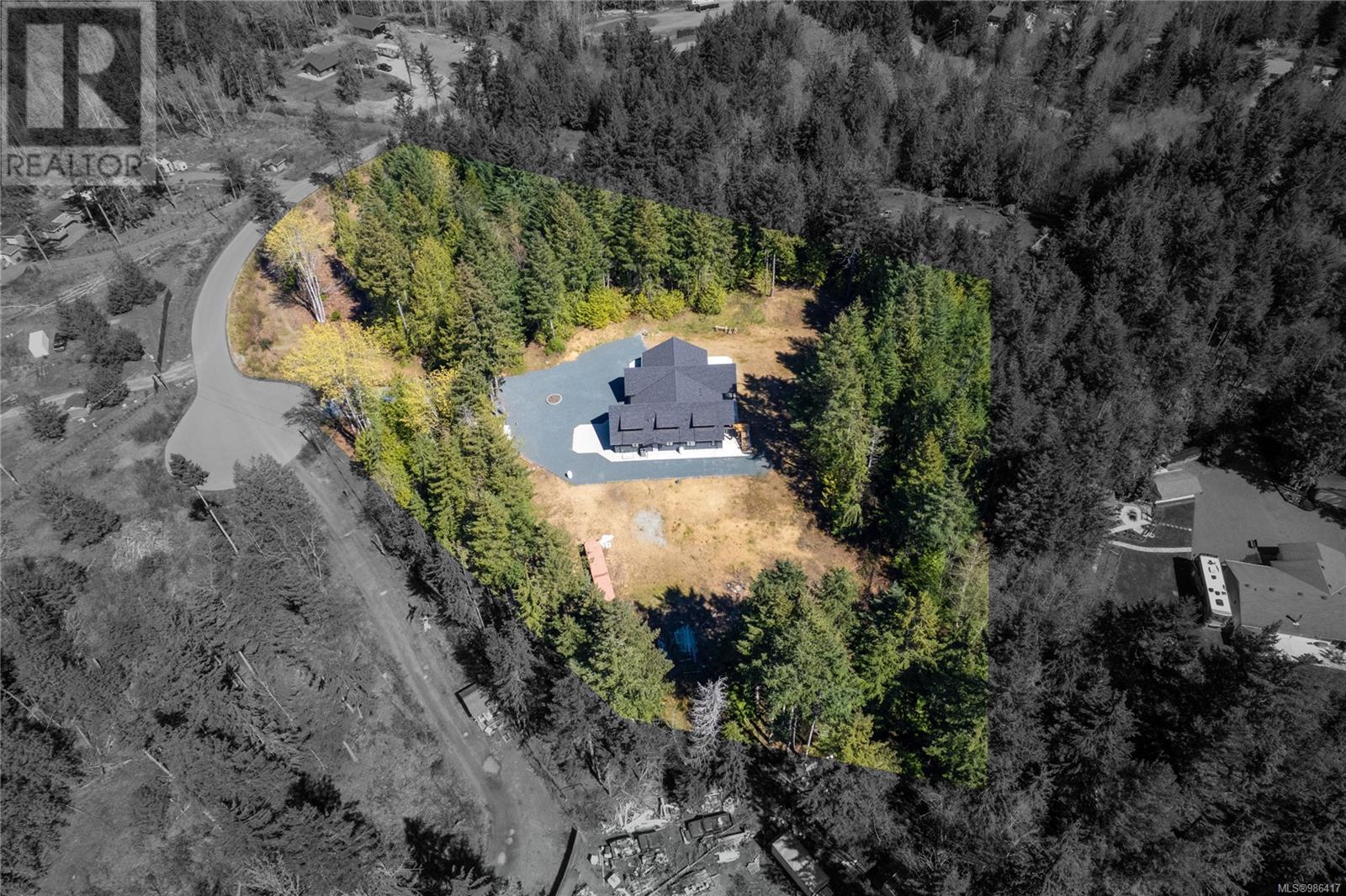 Photo 10 of 1940 Timberlake Pl, Qualicum Beach BC