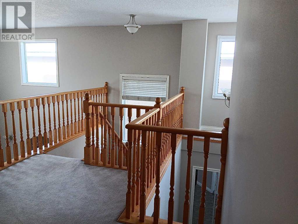 Single Family House for Sale in  Arbour Ridge Close NW Arbour Lake Calgary 