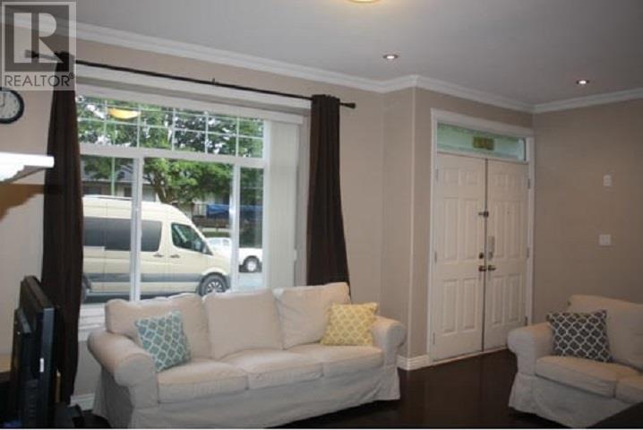 Photo 2 of 7441 15th Avenue, Burnaby BC