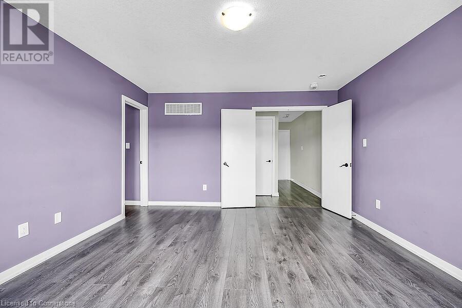 Photo 6 of 457 Queen Mary Drive, Brampton ON