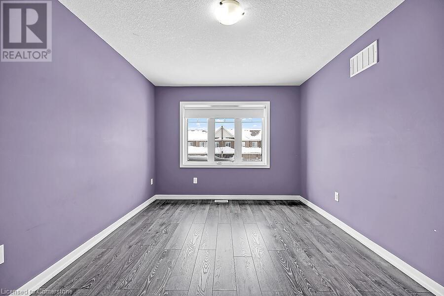 Photo 27 of 457 Queen Mary Drive, Brampton ON