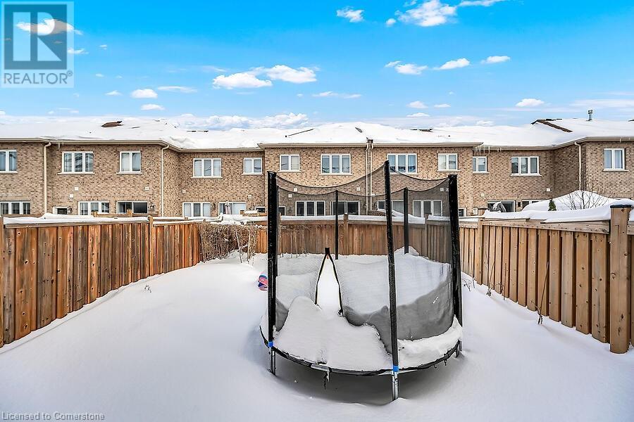 Photo 4 of 457 Queen Mary Drive, Brampton ON