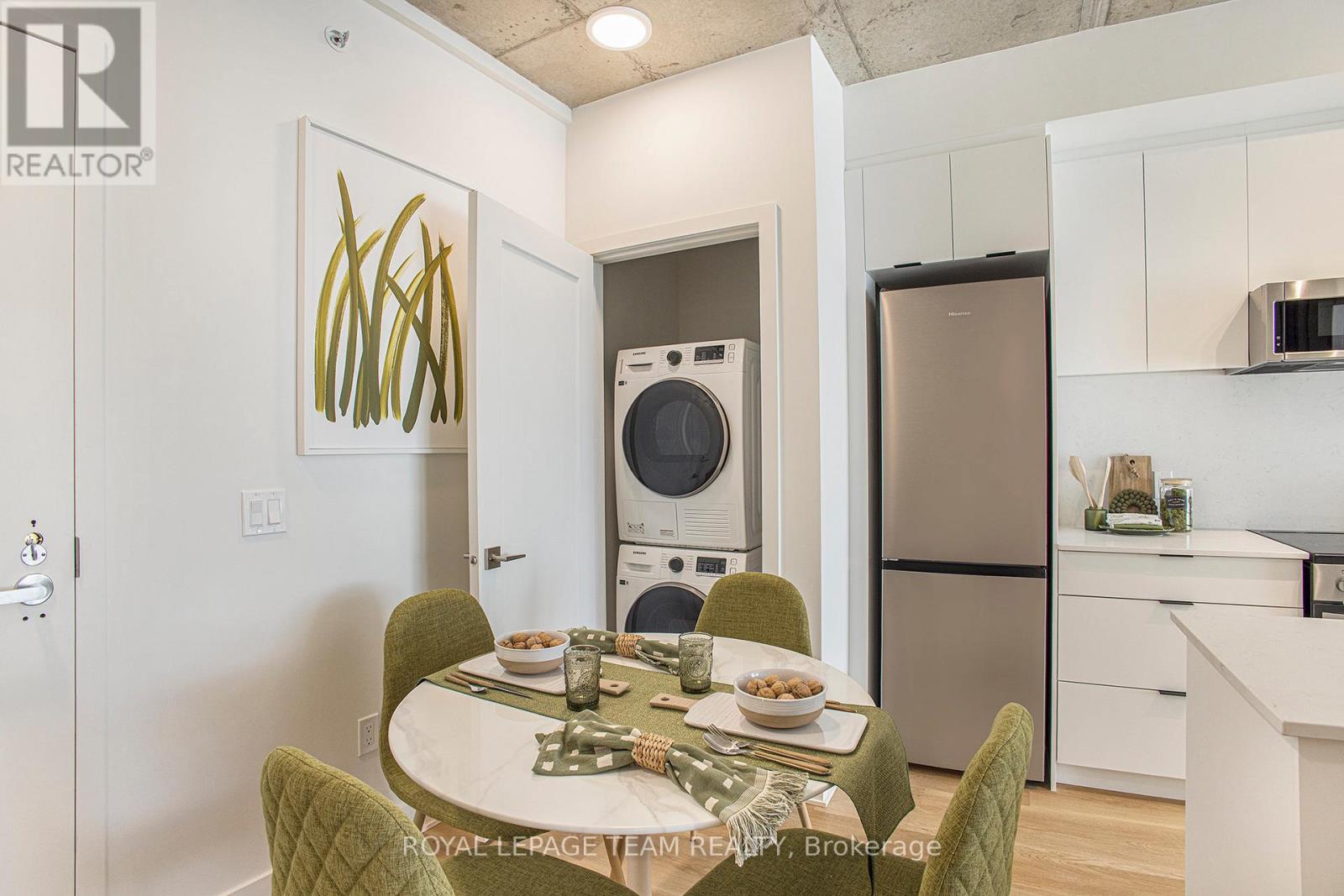 Model Unit A211 - Dining and In-Suite Laundry