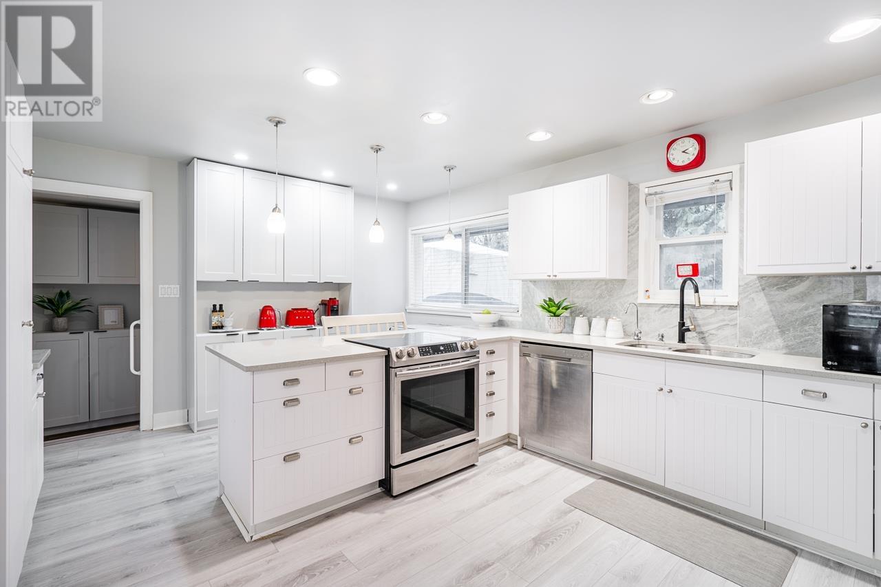 1050 COMO LAKE AVENUE, Coquitlam
