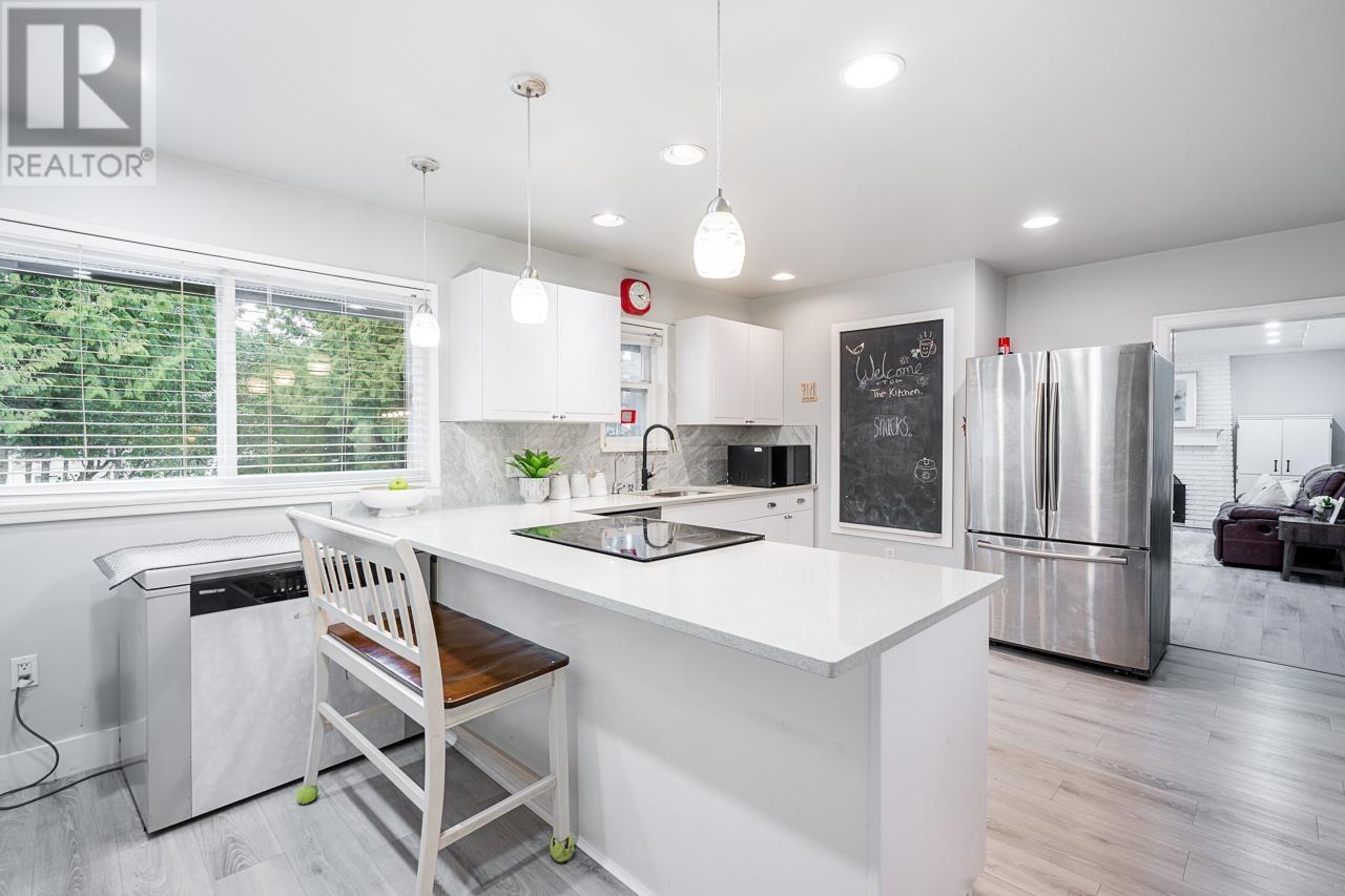 1050 COMO LAKE AVENUE, Coquitlam
