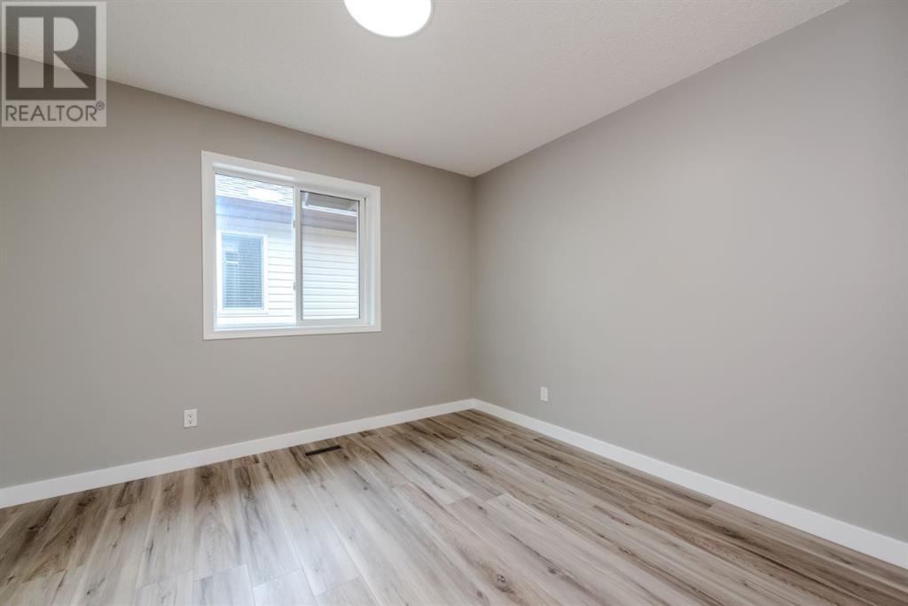 Photo 20 of 434 Coopers Drive Sw, Airdrie AB