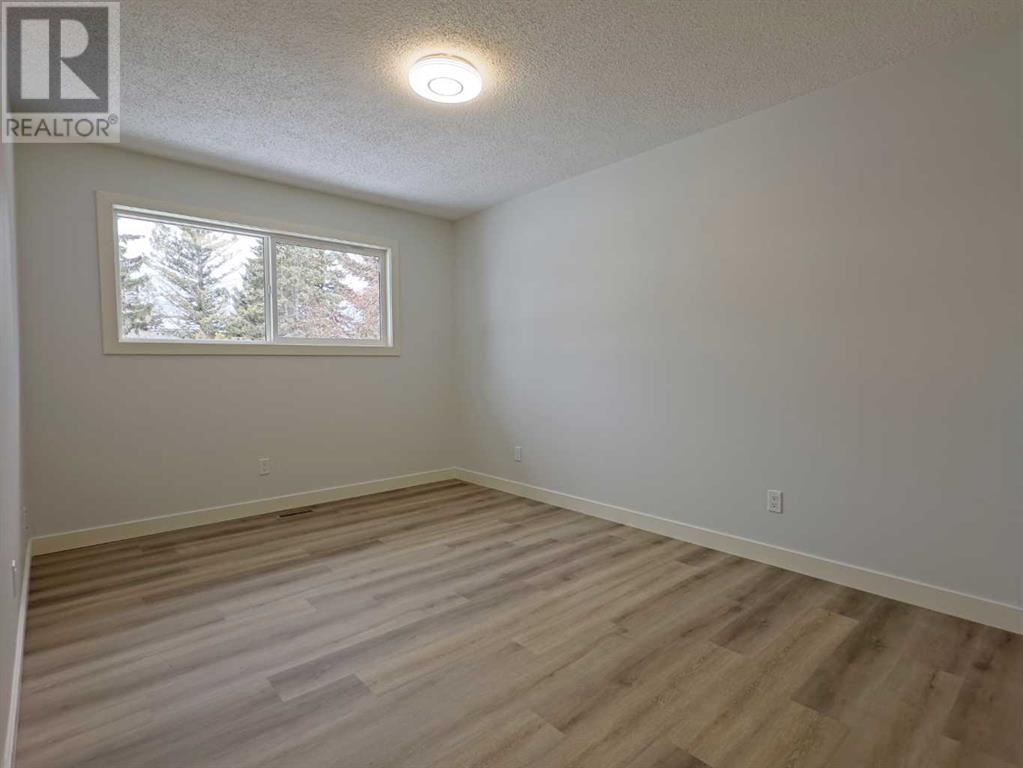 Single Family House Bi-level for Sale in   Street NW Silver Springs Calgary 