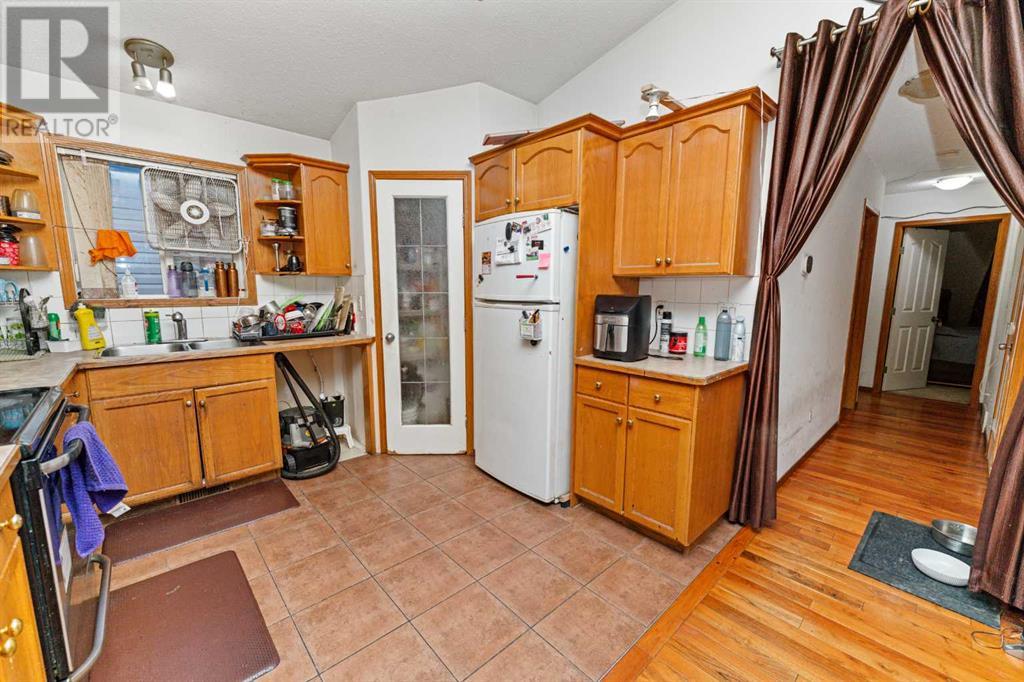 Single Family House Bi-level for Sale in  Tarawood Close NE Taradale Calgary 