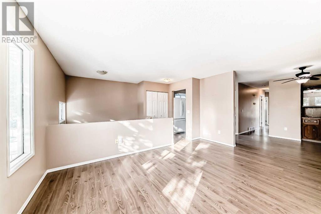 Single Family House Bi-level for Sale in  Macewan Drive NW MacEwan Glen Calgary 