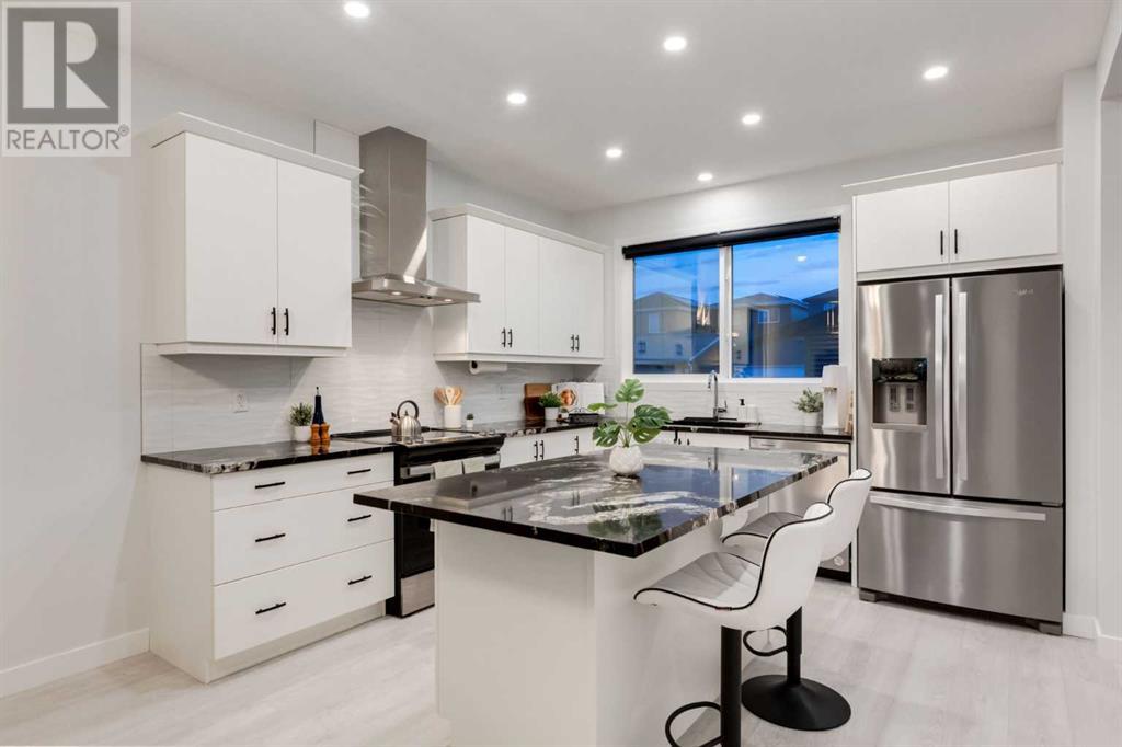 Single Family House for Sale in  Belmont Green SW Belmont Calgary 