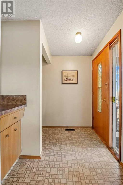 Multi-family House Bungalow for Sale in  &   Avenue NW Tuxedo Park Calgary 