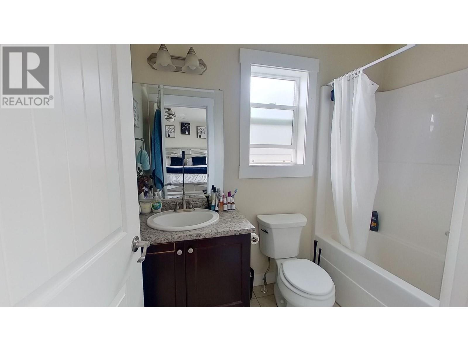 Photo 6 of 10909 104 A Avenue, Fort St John BC