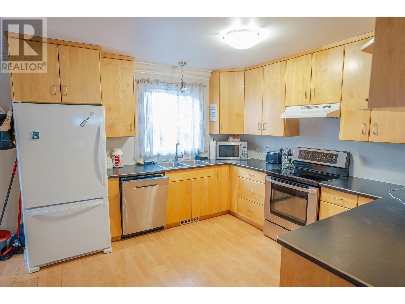 Photo 6 of 8703 8707 89 Avenue, Fort St John BC