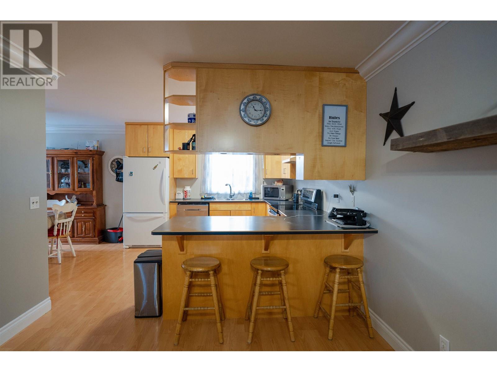 Photo 9 of 8703 8707 89 Avenue, Fort St John BC