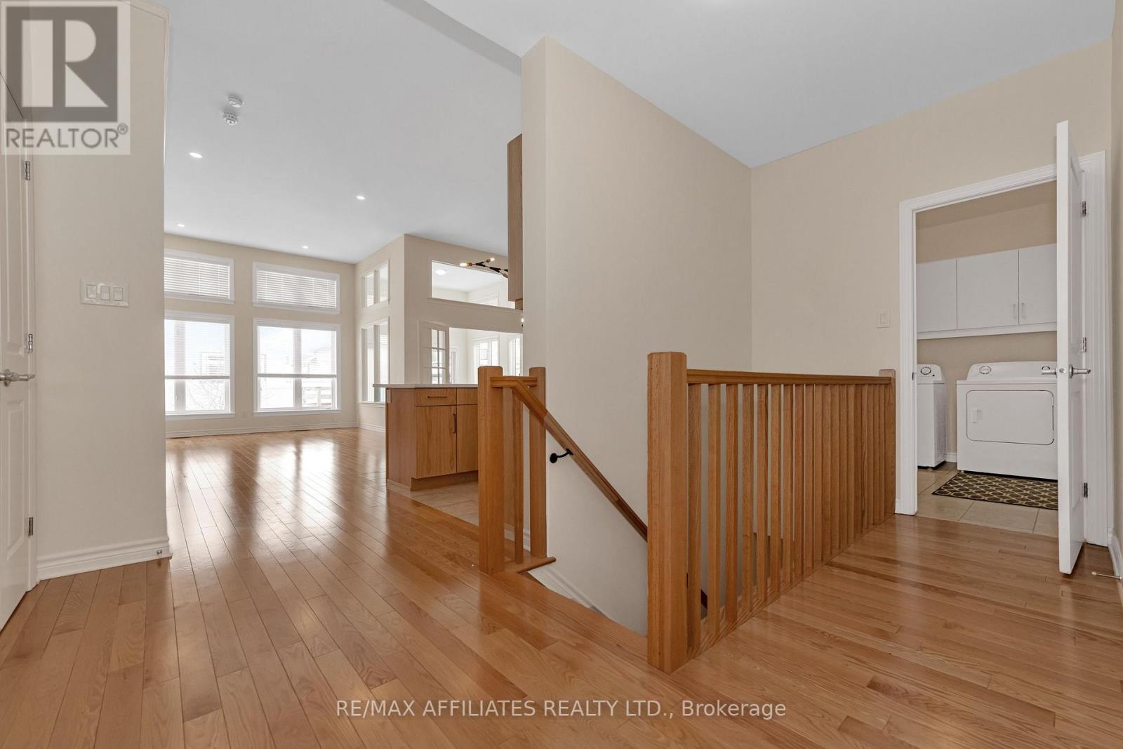 Gleaming Hardwood throughout + Oak Staircase