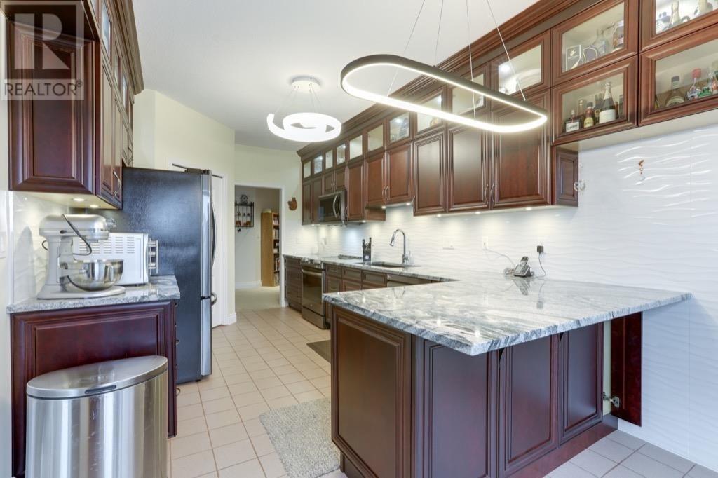 #307-4743 RIVER Road West, Delta