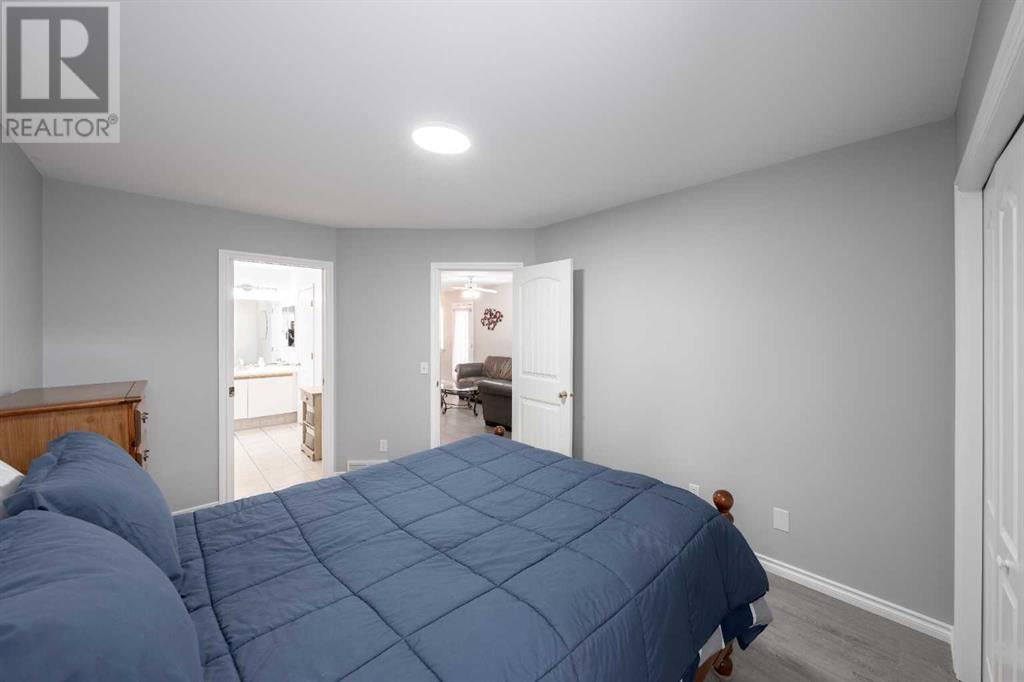 Single Family House Bi-level for Sale in  Laguna Way NE Monterey Park Calgary 